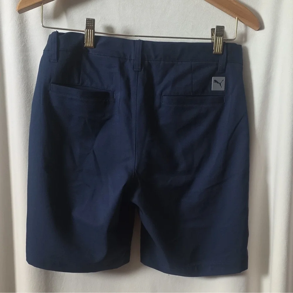 Puma youth boys navy performance shorts. Size large (13-14Y), made in Vietnam.